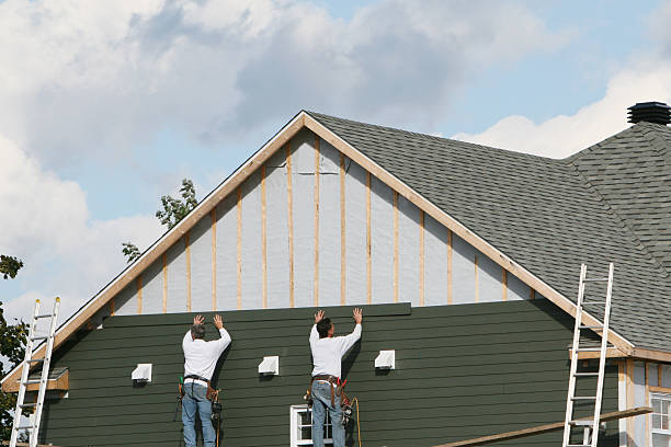 Professional Storm Damage Siding Repair technician working in Holmdel, NJ
